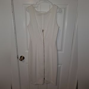 H&M, White form-fitting dress with gold zipper in back. Size 10